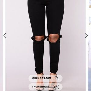 Distressed high waisted black jeans